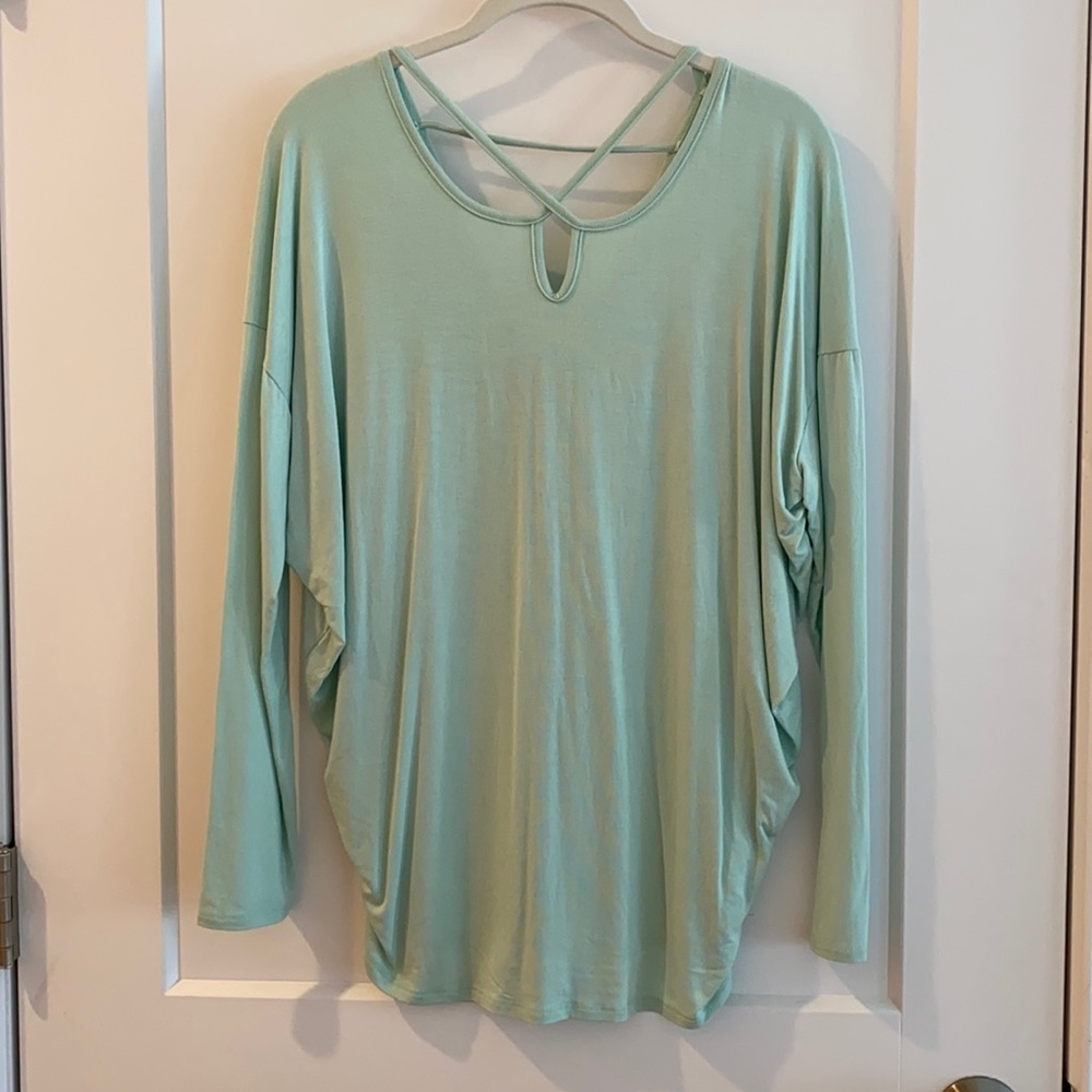 Women’s long sleeved top with chest cut outs size small